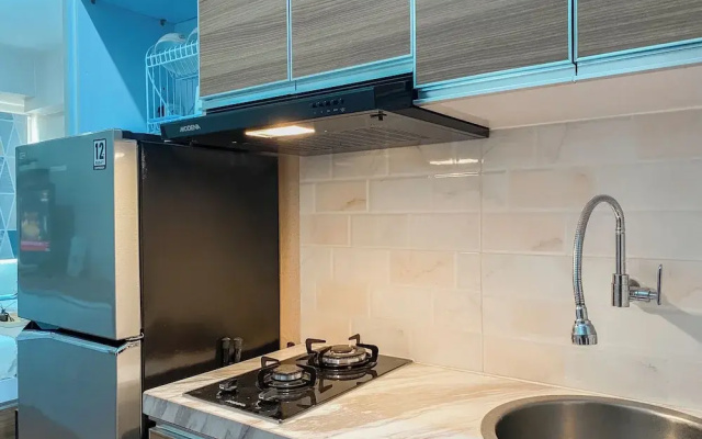 Warm and Homey Studio at Podomoro Golf View Apartment