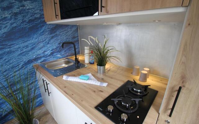 Tiny Wave Tiny House auf dem Campingplatz Strandgut