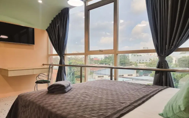 Q apaz Serviced Apartment