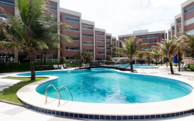 Apto térreo pé areia em Porto das Dunas