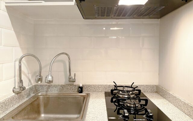 Minimalist Studio Grand Kamala Lagoon Apartment