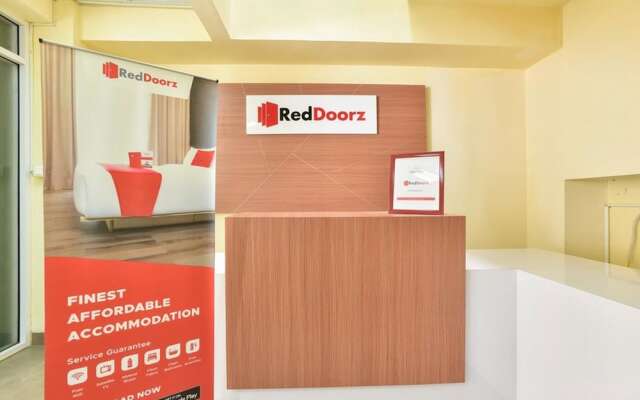 RedDoorz Plus near TIS Square