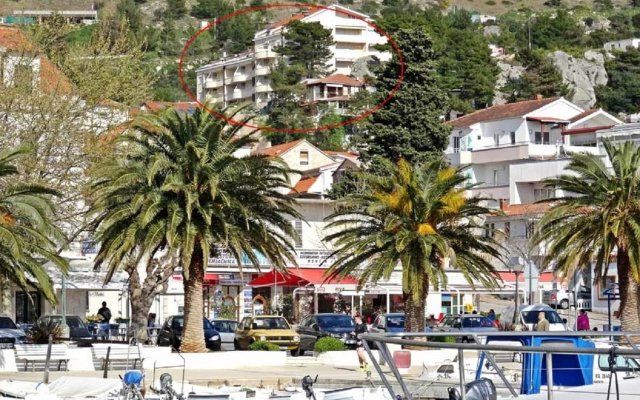 Apartment Suzi - beautiful view and cosy: A1 crvena kuhinja Baska Voda, Riviera Makarska