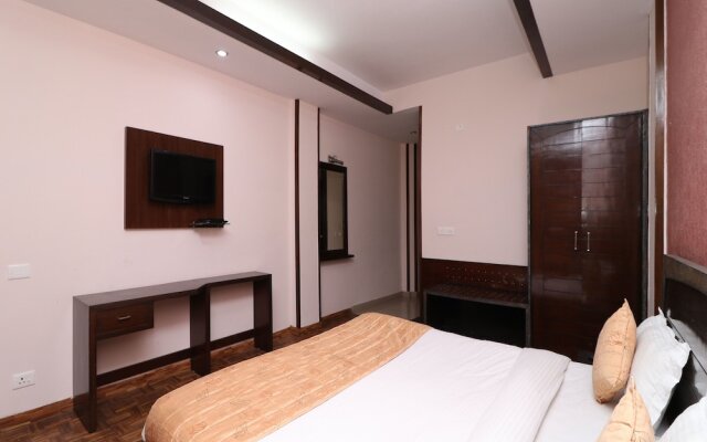OYO 7547 Hotel Burans Residency