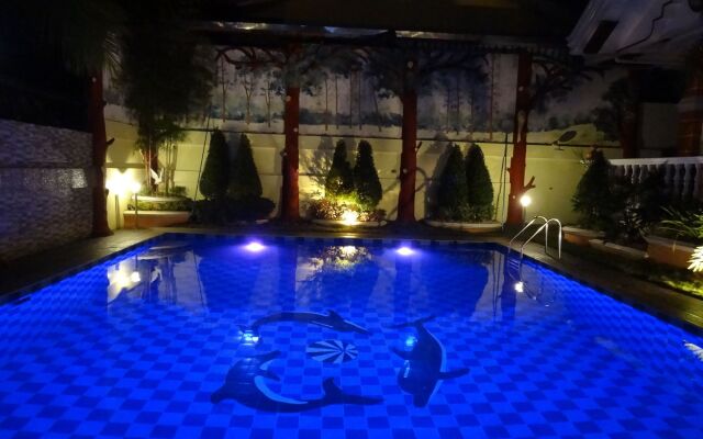 The Executive Villa Inn & Suites