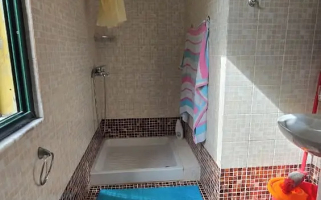 Tirent Apartment - Cozy Bedrooms Stay by Golem Beach.