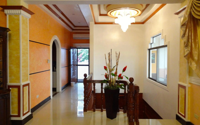 The Executive Villa Inn & Suites