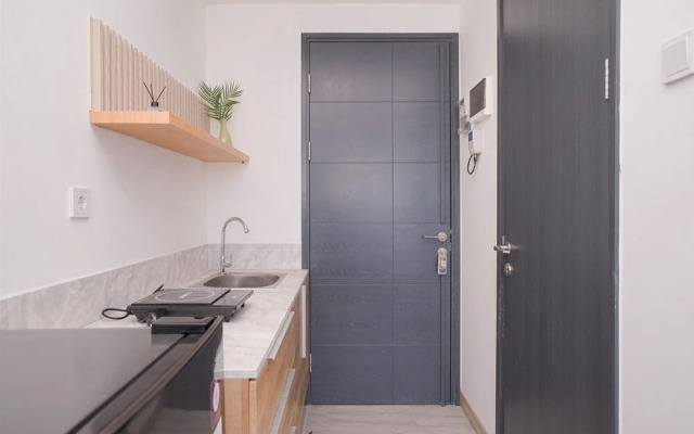 Fully Furnished and Homey Studio Collins Boulevard Apartment