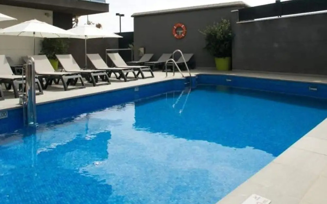 Belvilla by OYO Apartamento con Patio