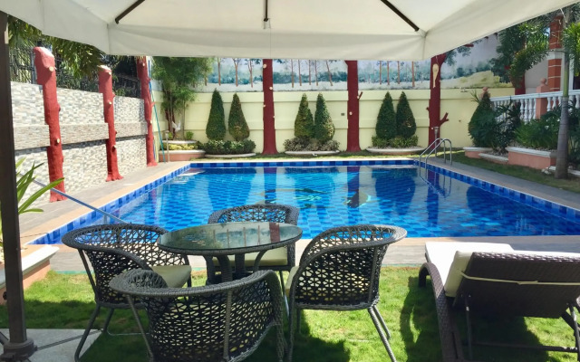 The Executive Villa Inn & Suites