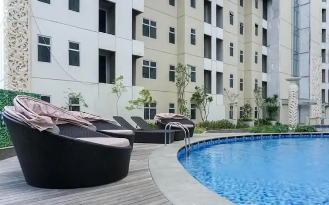 Homey 2BR Apartment with Space Room at Vittoria Residence