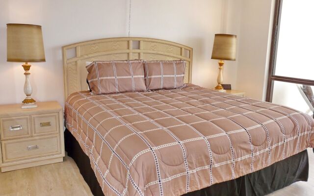 Inviting Beachfront Condo With Large Balcony and Pool