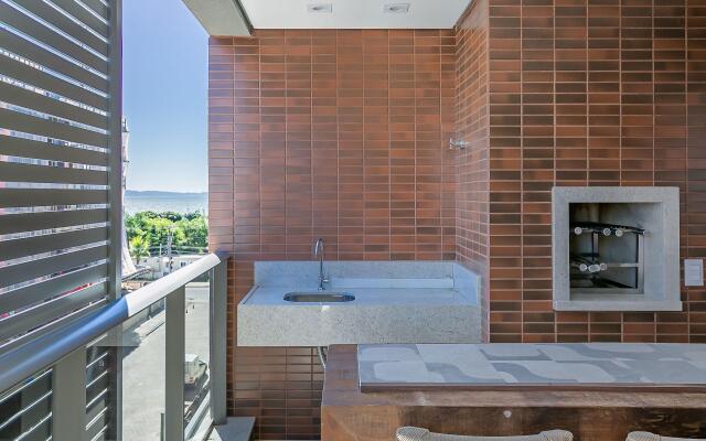 Vista parcial do MAR na varanda em Jurerê #JA24