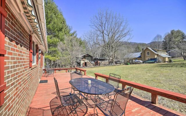 Quaint Creekside Home w/ Spacious Deck & Yard