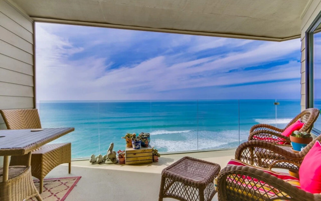 Work-Friendly Oceanfront Condo with Pool and Spa Access SURF25 by RedAwning