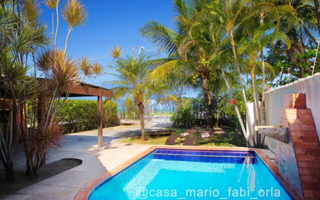 Casa frente praia na av beira mar com piscina