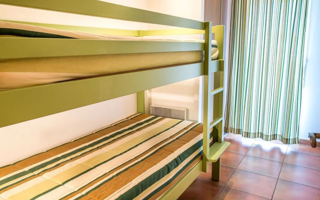 Comfortable apartment with terrace surrounded by pine trees