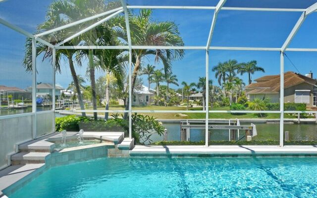 Relaxing Waterfront Home With Pool and Steps to Beach