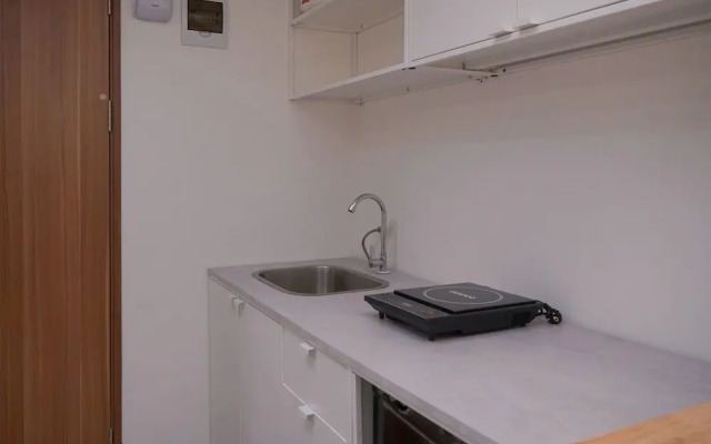 Warm And Simply Studio At Cisauk Point Apartment