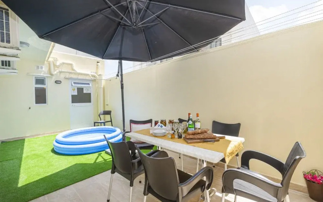 Summer Breeze Maisonette with Terrace by Getaways Malta