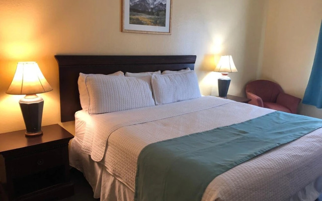 Deluxe 6 Inn & Suites