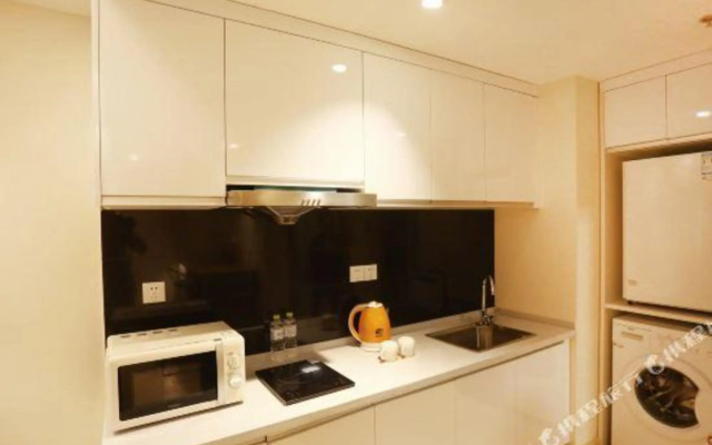 Qingdao Sihai Jiuzhou Hotel (Wuyue Plaza pengpaidao store)