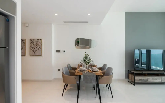 Elegant 2BR Emaar Beachfront Retreat