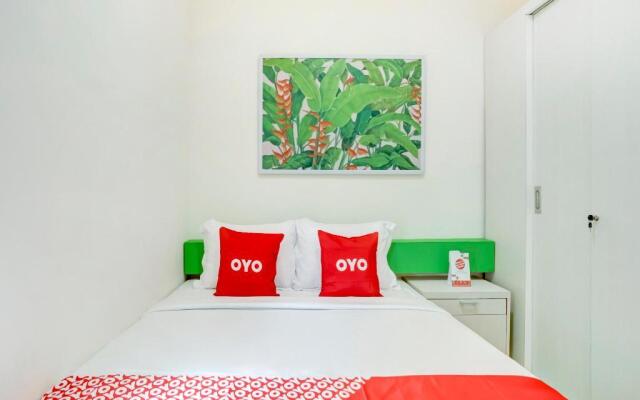 Oyo 90057 Riverside Bali Villas