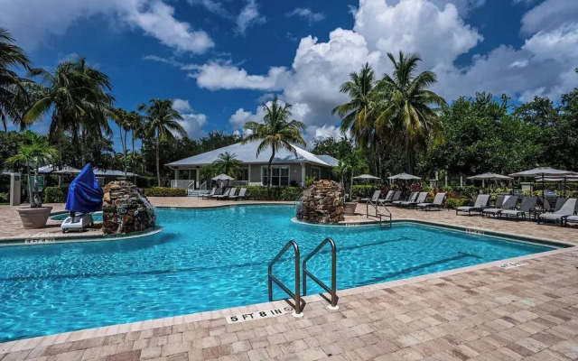 Asiago Vacation Rental at Lely Resort. Newly Furnished 2-Bedroom Condo with Stunning Lake & Golf Views. Spacious Retreat with Private Lanai, Resort Pool, Hot Tub and Gym Access