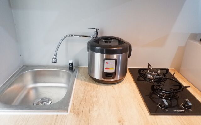 Comfy and Relaxing Studio Apartment at Educity Pakuwon By Travelio