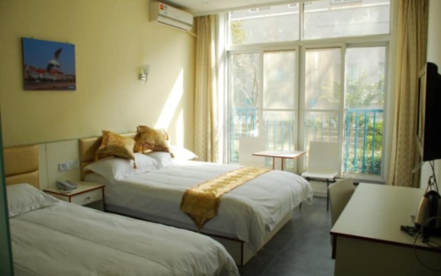 Qingdao HoMu Hotel Management Co.Ltd
