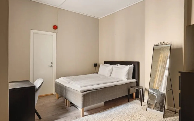 Fløyen Suites - Private Rooms I Location