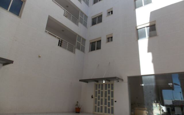 White Deluxe Apartments