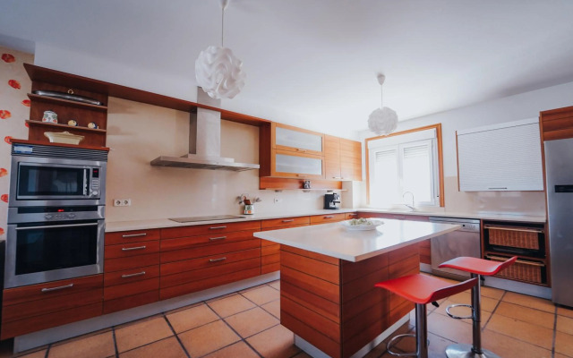 Villa con piscina a pie de playa