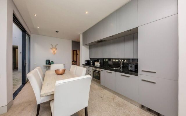 Spacious Holiday Apartment With Pool in Trendy De Waterkant Loader Apartment