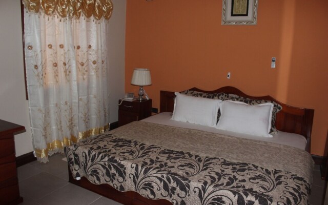 Oguaa Apartments & Lodging