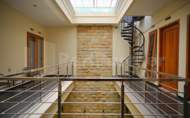 One & Quin Guest House Syariah