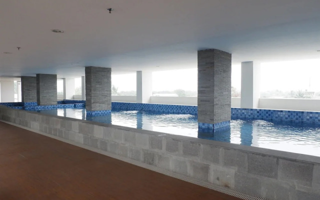 Comfortable and Warm Studio at Poris 88 Apartment