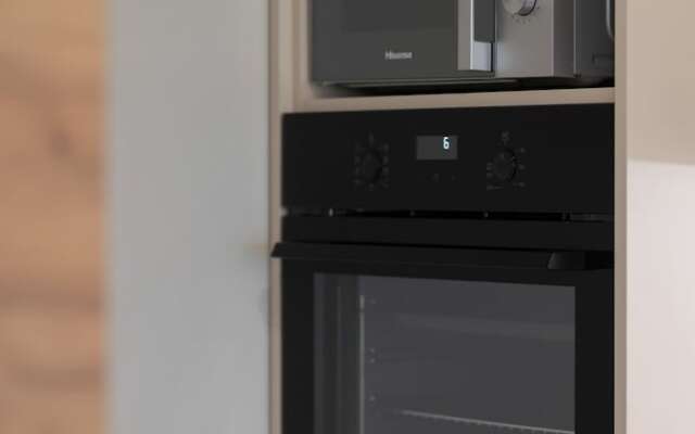 Aleja Jana Pawla II Studio by Renters