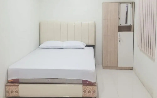 KoolKost near Universitas Pembangunan Panca Budi Medan