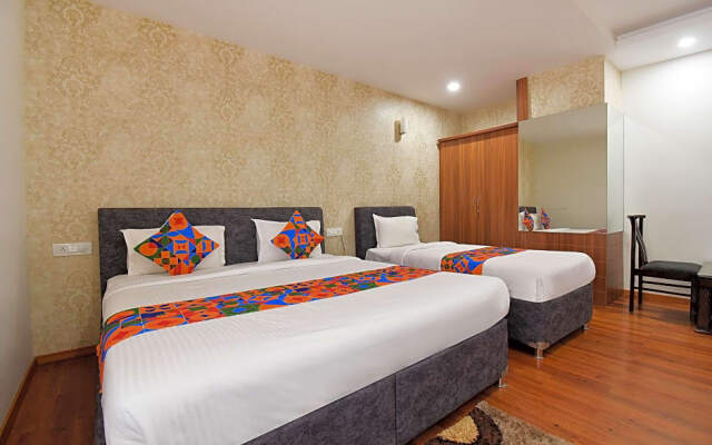 Fabhotel Dhanvitha Suites