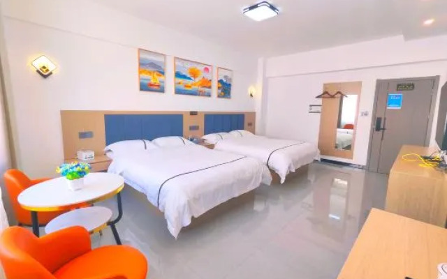 Zhaotong Dongjia Hotel (Jinhai Building Materials City)