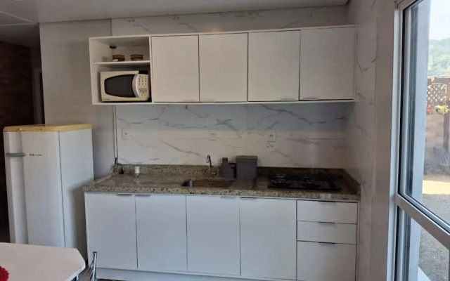 Refúgio Romântico entre o Verde e o Mar