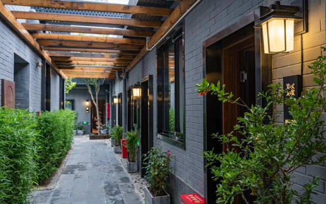 Qiuguo Hutong Courtyard Hotel