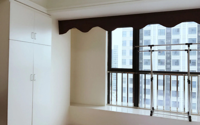 Xingyue Apartment Luogang Wanda