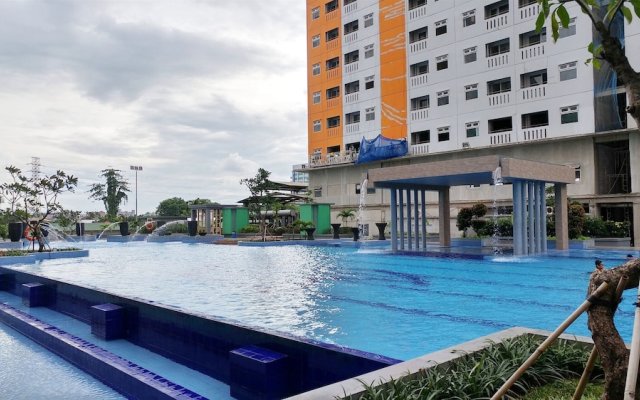 Restful and Tidy 2BR at Green Pramuka City Apartment