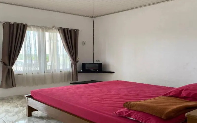 Putih Salju Homestay Syariah – Guest Rooms – Indralaya