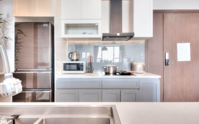 REM Rivergate Garden Pool Signature Apartments