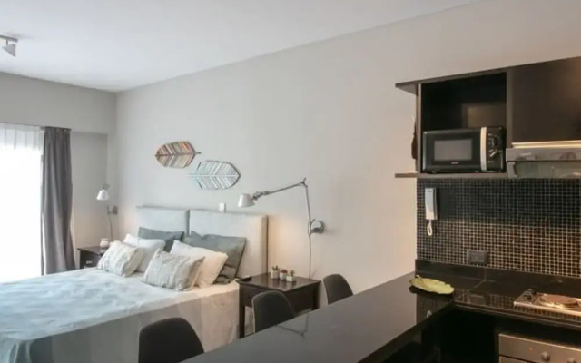 The Feather Comfortable Studio With Balcony