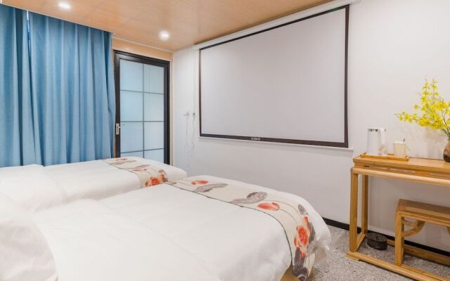 Floral Hotel Yi Shu Yu She Zhouzhuang